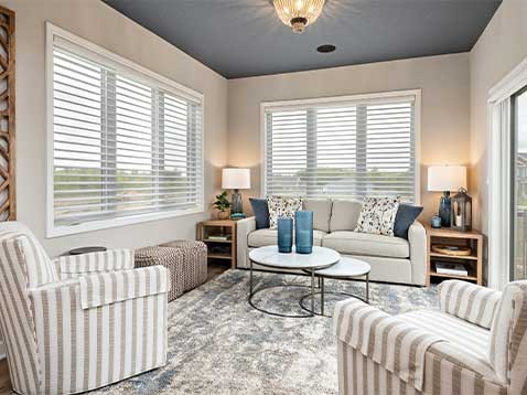 Modern living room showcasing hanging blinds