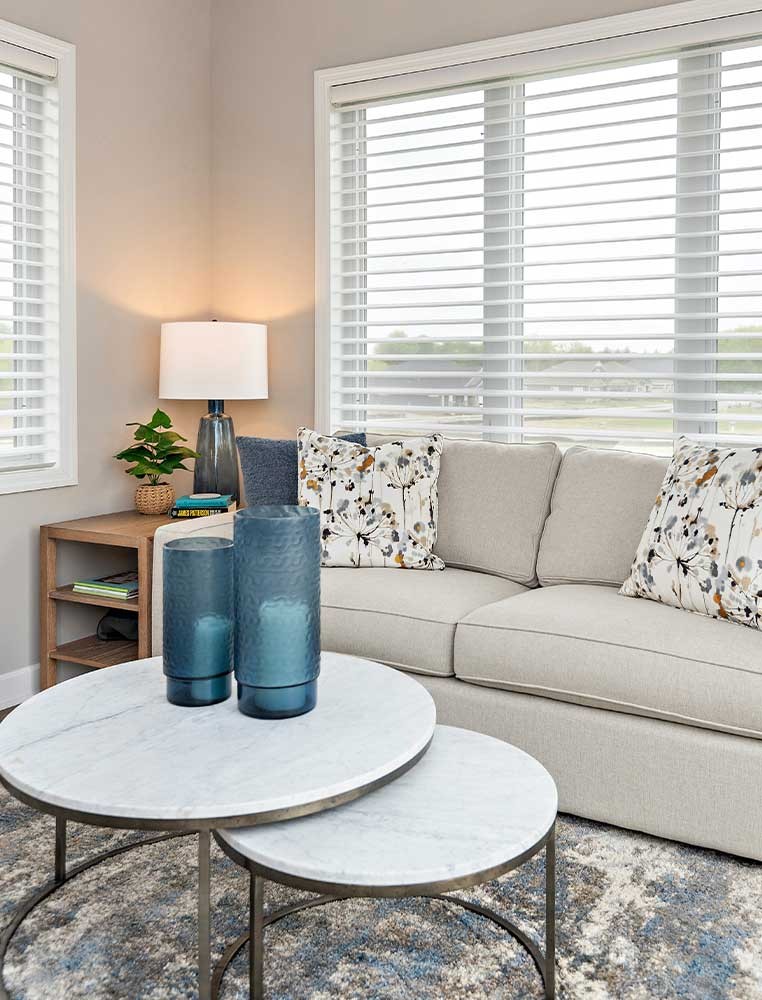 Modern living room showcasing hanging blinds